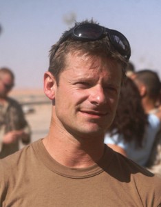 Conversing with a group of Marines, Steve Zahn, an actor from the films National Security and Saving Silverman, experiences the life of a Marine on a small base while sharing a few jokes with the service members during a visit to Delta Company, 4th Light Armored Reconnaissance Battalion, 2nd Light Armored Reconnaissance Bn., Regimental Combat Team 5 at Combat Outpost Akashat, Iraq, July 6. The celebrities visited here and other bases around Iraq to provide service members with a special thank you.